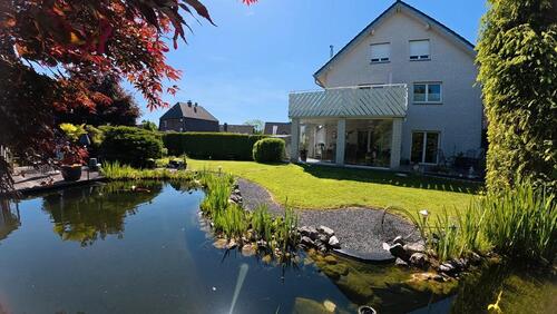 Foto - Gehobene Eigentumswohnung mit. Schwimmteich, Garten, Wintergarten