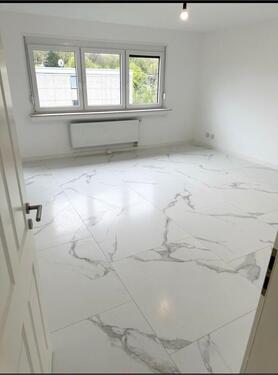 Foto - Hochwertige kernsanierte 3-Zimmer Eigentumswohnung mit Loggia