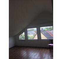 Helle Dachgeschosswohnung mit großen Balkon - Holle