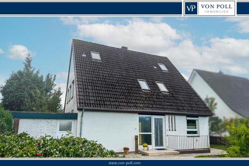 Foto - Erdgeschosswohnung in ruhigem Zweifamilienhaus mit überdachter Terrasse & Carport
