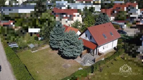 Foto - Einfamilienhaus-Familienfreundliches Wohnen mit Garten, Wintergarten und moderner Ausstattung