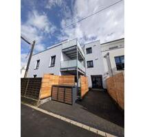 2-Zimmer-Erdgeschosswohnung Effizienzhaus40 Terrasse Grünstreifen - Leverkusen Bürrig