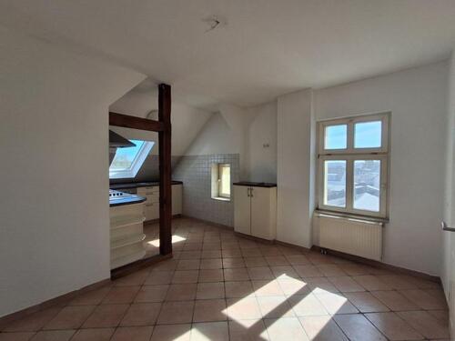 Foto - 2,5-Zimmer Dachgeschosswohnung mit Kirchblick und Einbauküche