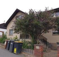 Einfamilienhaus mit Garten und Blick auf die Frankfurter Skyline - Ober-Olm