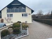 Foto - Einfamilienhaus mit Einliegerwohnung. Mehrgenerationenhaus