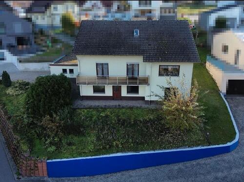 Foto - Vermietetes Einfamilienhaus zu verkaufen