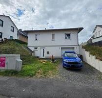 Massivbau Bungalow mit Tiefgarage, Keller und viel Platz - Hennef (Sieg)