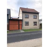 Einfamilienhaus mit Nebengebäude und Gartenanteil - Vogtei