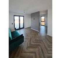 Moderne Neubauwohnung (KfW 40) mit Einbauküche in Grünberg-OT