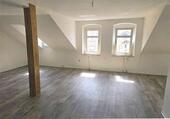 Foto - Moderne Dachwohnung mit offenem Wohnkonzept