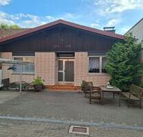 Bungalow mit angrenzendem Garten und vermietetem 3-Familienhaus - Rodalben