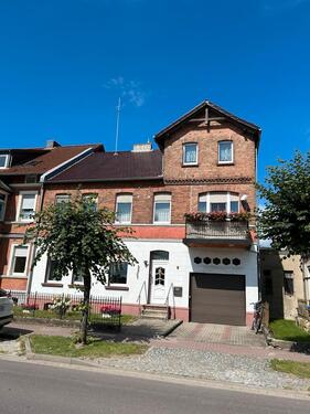 Foto - Einfamilienhaus mit Einliegerwohnung