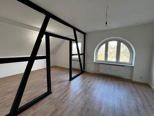 Foto - Kernsanierte Dachgeschosswohnung mit Garten – Erstbezug