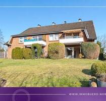 Wohnen mit Garten: Renovierte Erdgeschosswohnung mit Terrasse, Garage und Vollkeller - Kellinghusen