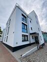 Foto - Neubau: Helle 3-Zimmer-Wohnung mit Balkon & Einbauküche in Bad Fr
