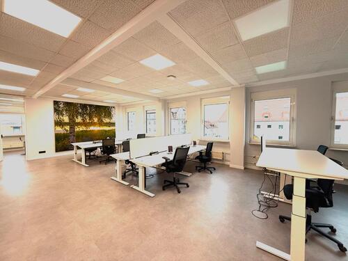 Foto - Es ist mehr als ein Schreibtisch: Moderner Coworking Space in München