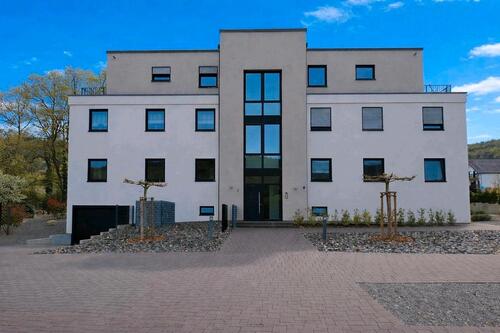 Foto - Moderne Eigentumswohnung mit Terrasse und Garten