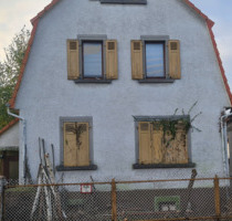 Grundstück mit stark sanierungsbed. Haus - erst lesen - Rüsselsheim am Main