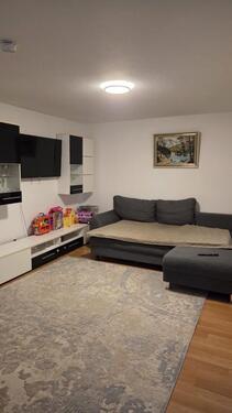 Foto - 2-Zimmer-Wohnung mit überdachtem Vorplatz & Gartenmitbenutzung – Erdgeschoss