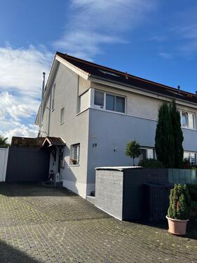 Foto - Topp-Reihenendhaus mit Wintergarten, Kaminofen und Photovoltaik