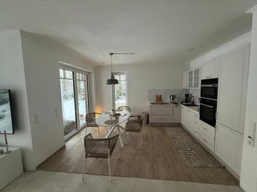 Foto - Moderne Einliegerwohnung auf einer Ebene – möbliert, All-in