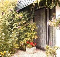 Großzügiger Winkelbungalow (Satteldach, Fußbodenheizung, Garage) - Soltau