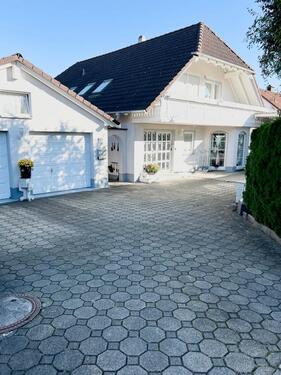 Foto - Einfamilienhaus mit Einliegerwohnung