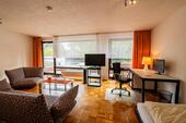 Foto - Zentrales freies App. (1.OG) mit Südbalkon, Keller und Garage
