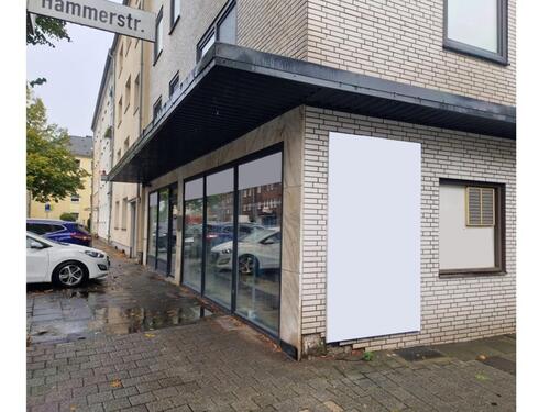 Foto - Helle Eck-Gewerbefläche mit großer Fensterfront – ideal für Laden