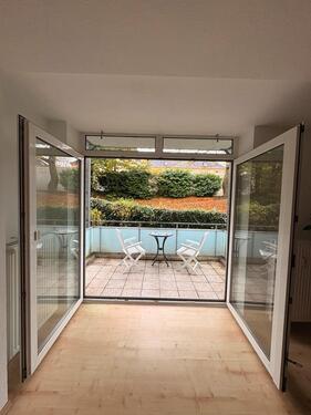 Foto - 2,5 Raum Wohnung mit Balkon und kleinen eingezäunten Garten