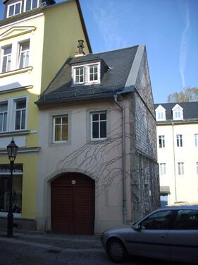 Foto - Kleines Torbogenhaus mit 2 - Raum-Wohnung