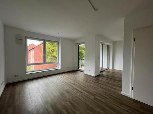 Foto - Neuwertige 2-Zimmer-Eigentumswohnung mit Loggia und Carport