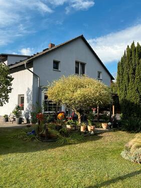 Foto - Grundstück mit Einfamilienhaus und großem Garten