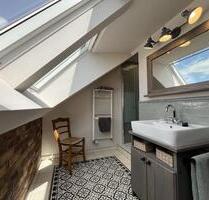 Zentrale Obergeschosswohnung mit Dachterrasse in Wagenfeld