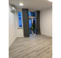 Erdgeschosswohnung mit Hofgarten, EBK, Erstbezug nach Sanierung - Düsseldorf Stadtbezirk 6