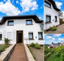 Zweifamilienhaus in Menningen mit großem Grundstück - Merzig