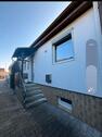 Foto - sarniertes Reienmittelhaus mit Garage