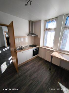 Foto - Helle 2-Raum Wohnung mit Einbauküche im ersten Stock .