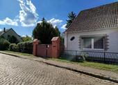 Foto - Großes Grundstück mit ausbaufähigem Einfamilienhaus