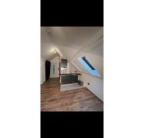 Ein Zimmerwohnung mit Einbauküche - Bischofsheim