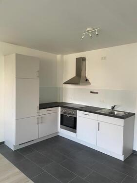 Foto - Attraktive 2-Zimmer Wohnung mit heller Einbauküche und Stellplatz