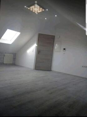 Foto - Helle Dachgeschosswohnung (55 m²) in ruhiger Lage zu vermieten