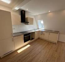 Erstbezug nach Sanierung – 4 Zimmer, Balkon, Garage, EBK | 96 m² - Munster