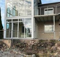 Helle Erdgeschosswohnung mit Terrasse und Wintergarten - Hüllhorst