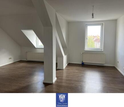 Foto - Individuelle DG-Etagenwohnung mit vorteilhafter Raumaufteilung und schönem Blick!