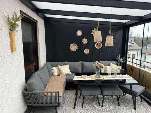 Foto - Renovierte DG-WG mit Wintergarten & Tiefgarage in Feldrandlage..