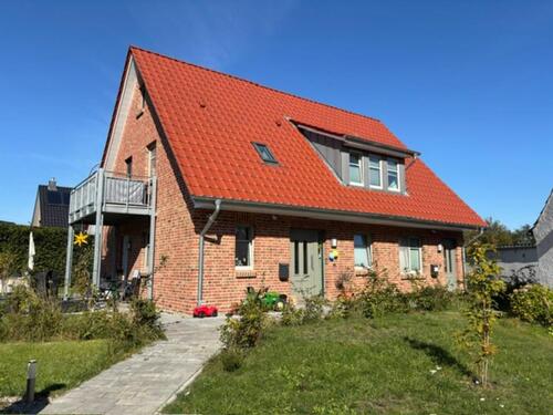 Foto - Drei Zimmer Erdgeschoßwohnung im Zweifamilienhaus