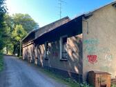 Foto - Grundstück mit renovierungsbedürftigem Gebäude und Reihengarage