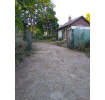 Sonniges Gartengrundstück eingezäunt mit gemauertem Haus - Renningen