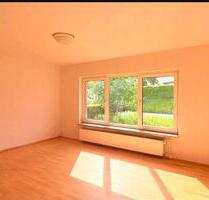 Helle 3-Zimmer-Erdgeschosswohnung mit Gartennutzung Stellplatz - Langgöns